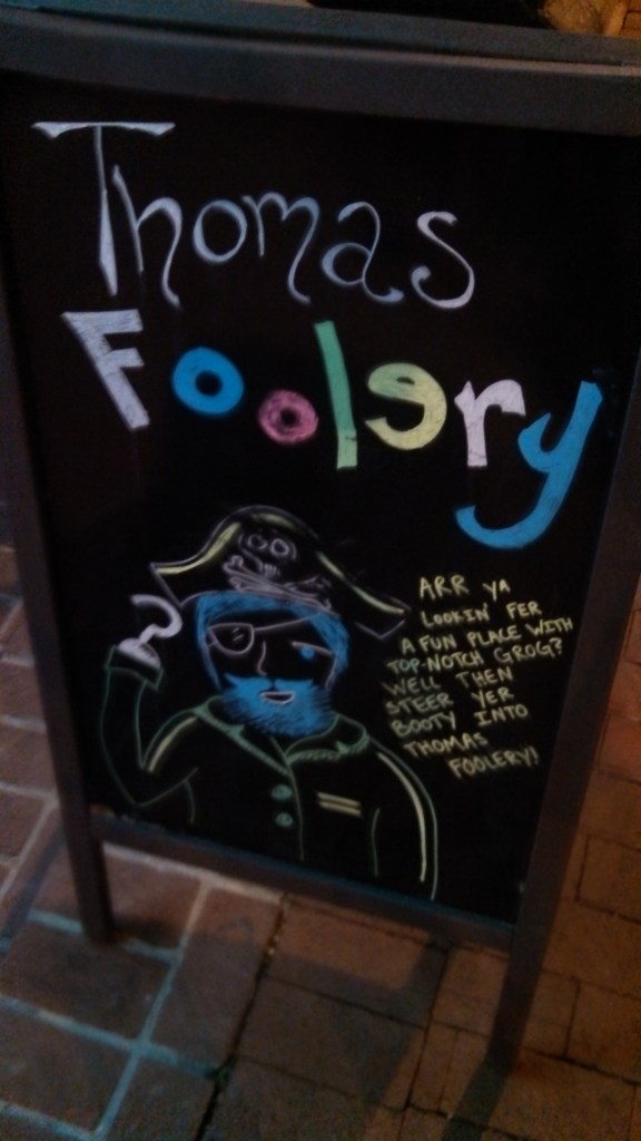 Sidewalk Chalkboard Sign Hints at the Goofiness of Thomas Foolery